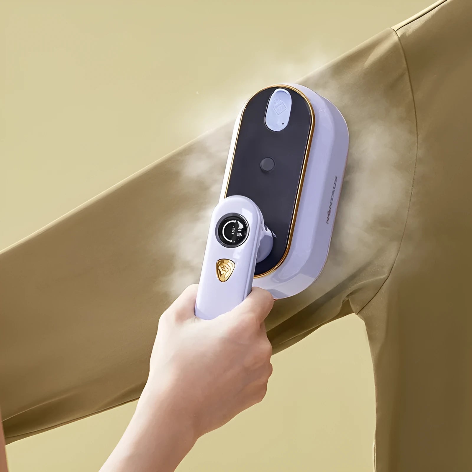 Portable travel iron with foldable handle in light purple colour showing ceramic soleplate