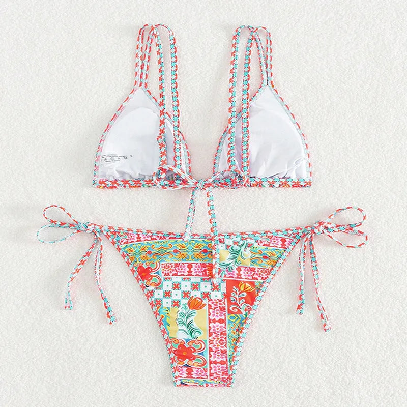 Women's lace-up split swimsuit in picture colour with backless design and briefs style