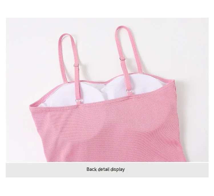 Women's long-sleeved one-piece swimsuit in polyester fabric available in pink and black colours