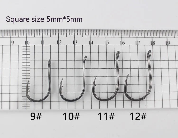 Bulk pack of alloy carbon steel barbed fishing hooks with crooked mouth and hole ring for rock and sea fishing.