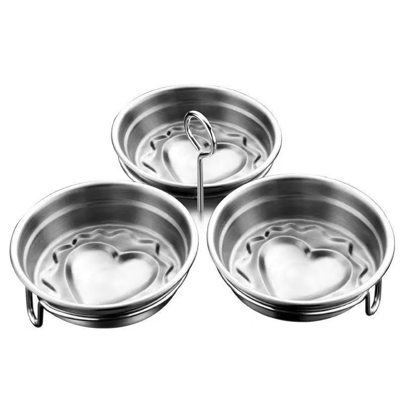 Stainless steel mini egg steamer in heart-shaped and round designs for boiling and stewing eggs.
