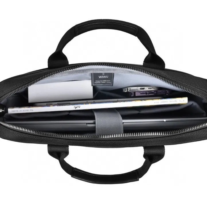 Black Oxford cloth laptop rucksack with multiple pockets and a lock, shown fitting a 15.6-inch laptop.