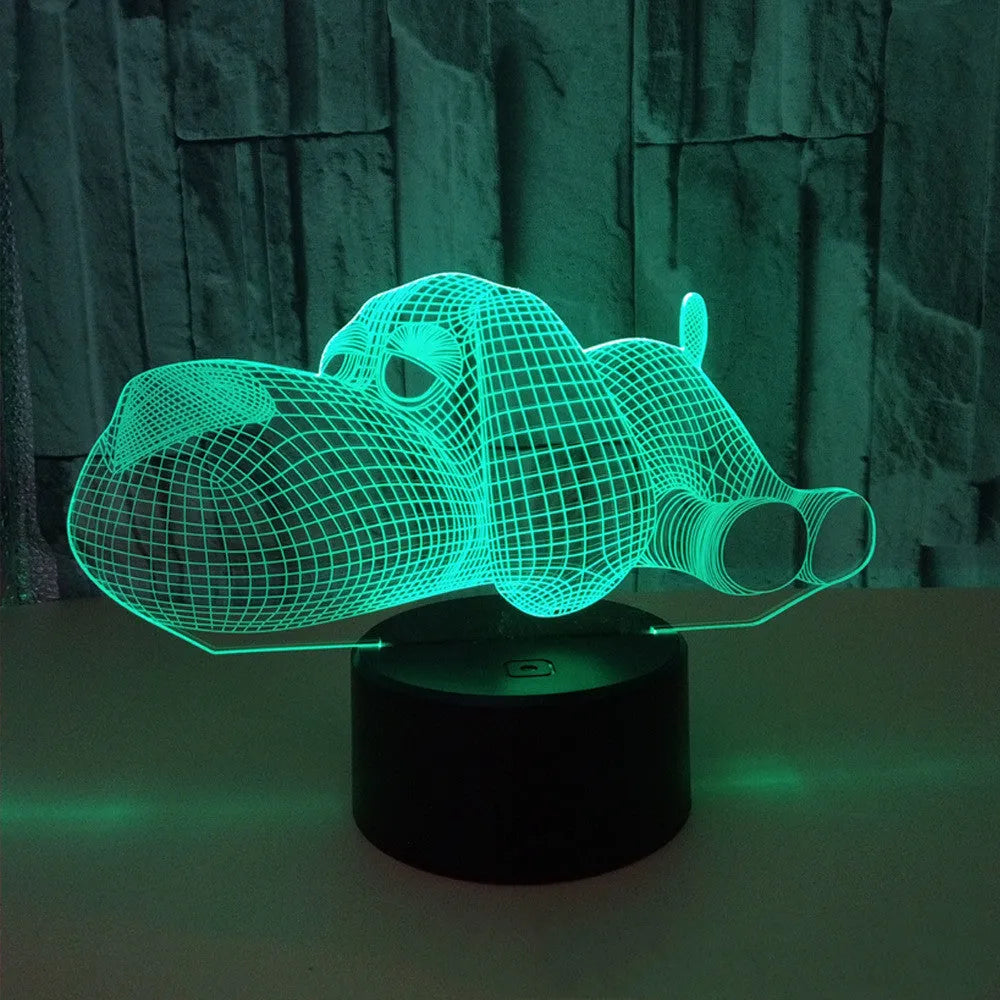 3D illusion dog lamp glowing with multi-colour light on a desk base