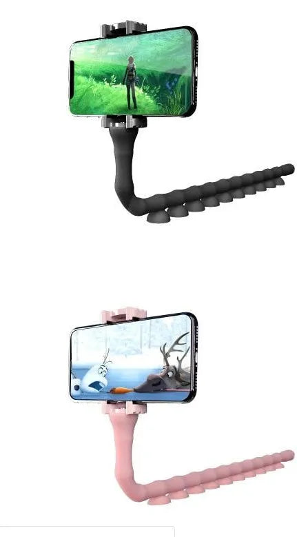 Flexible black suction cup phone holder bent into position on a desktop