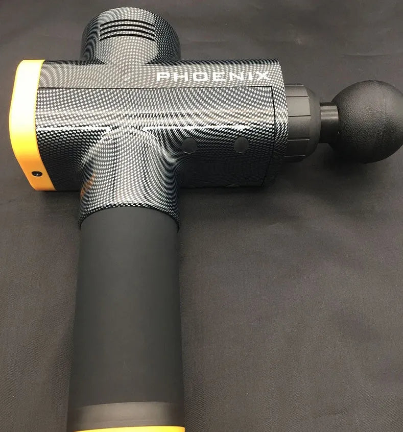 Black fascia massage gun with four different coloured massage heads on a grey background.