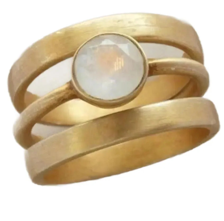 Gold-plated geometric titanium steel ring with micro-inlaid white chalcedony detail shown on finger