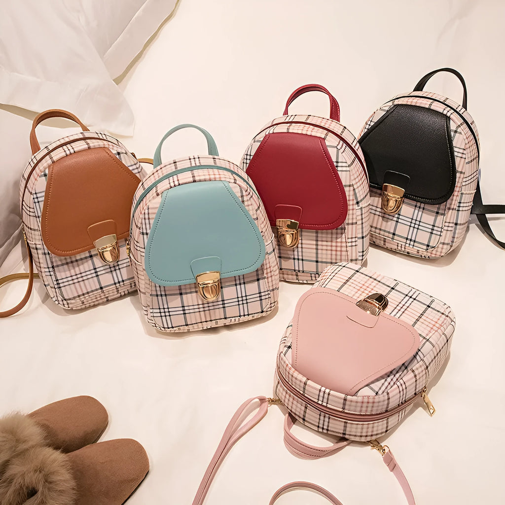Diagonal shoulder phone bag in PU material showing adjustable strap and handheld carry option