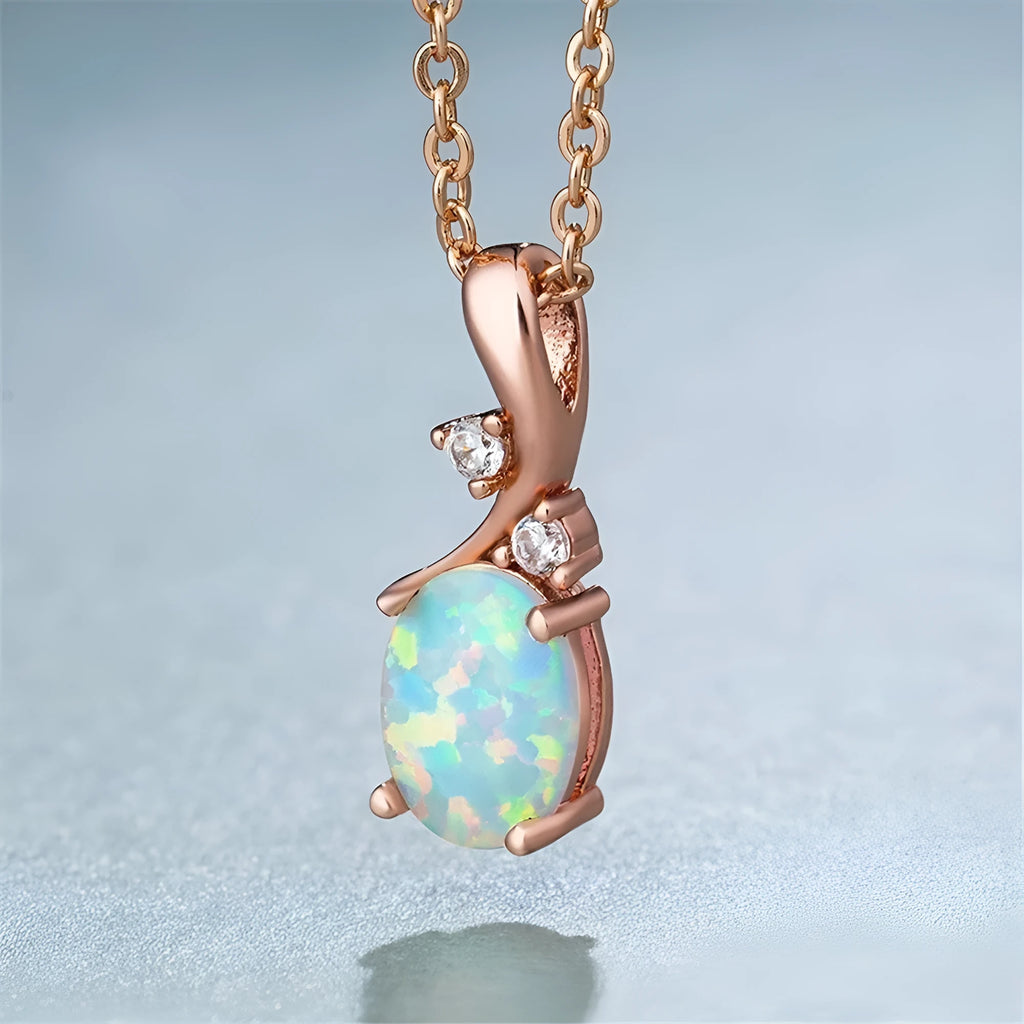 Water drop shaped opal pendant necklace on adjustable O chain in rose gold or white