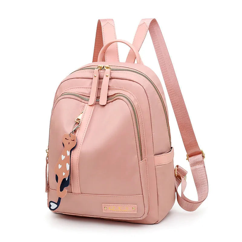 Women's black nylon casual backpack with waterproof construction and anti-theft compartments