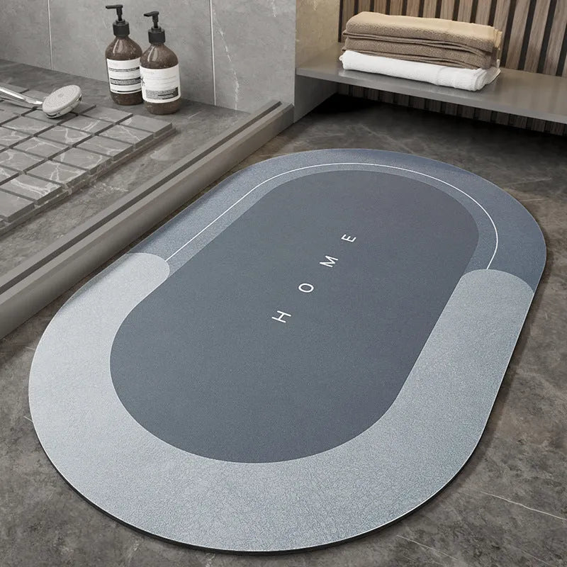 Blended fabric floor mat in an oval shape on a bathroom floor, available in multiple colours and sizes.