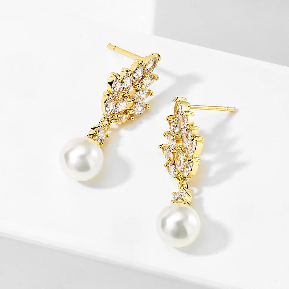 Geometric flower earrings with zircon stones and pearl accents in gold, white gold, or rose gold plating
