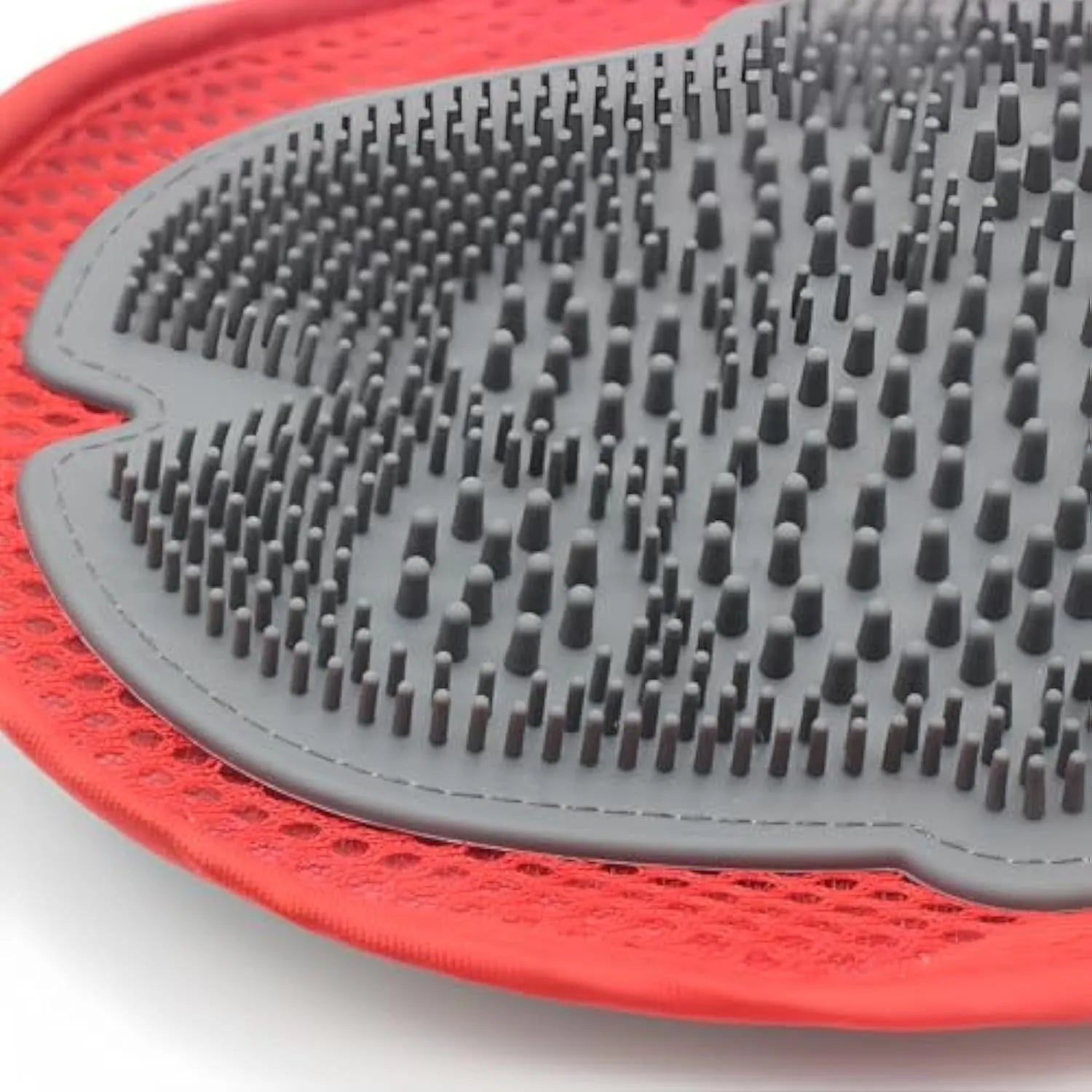 Red pet grooming glove with integrated silicone brush bristles for bathing and hair removal