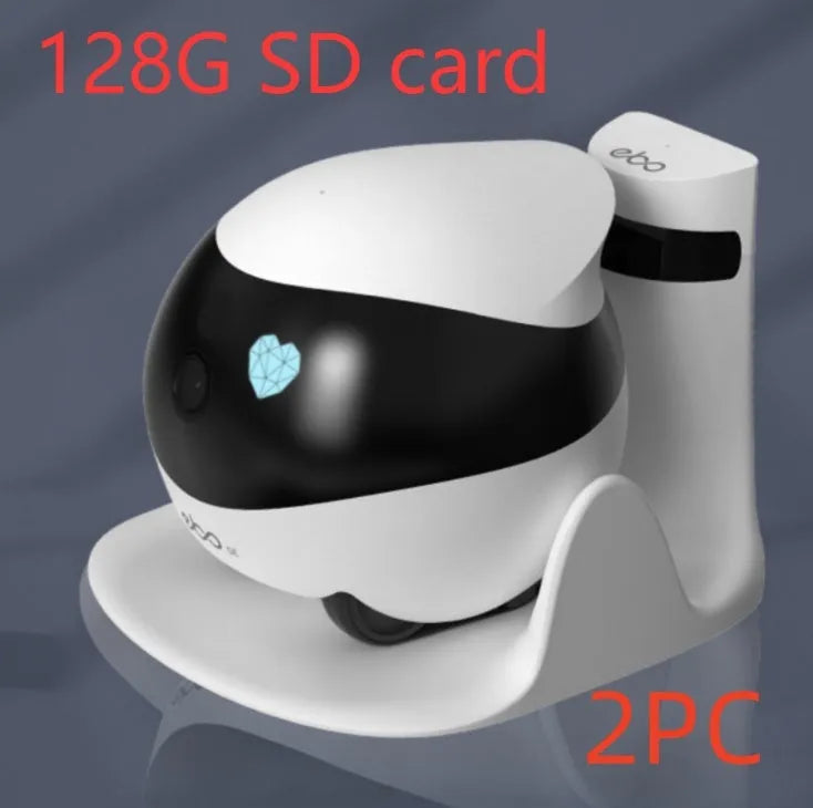 White mobile surveillance robot camera with wheels next to its automatic charging docking station