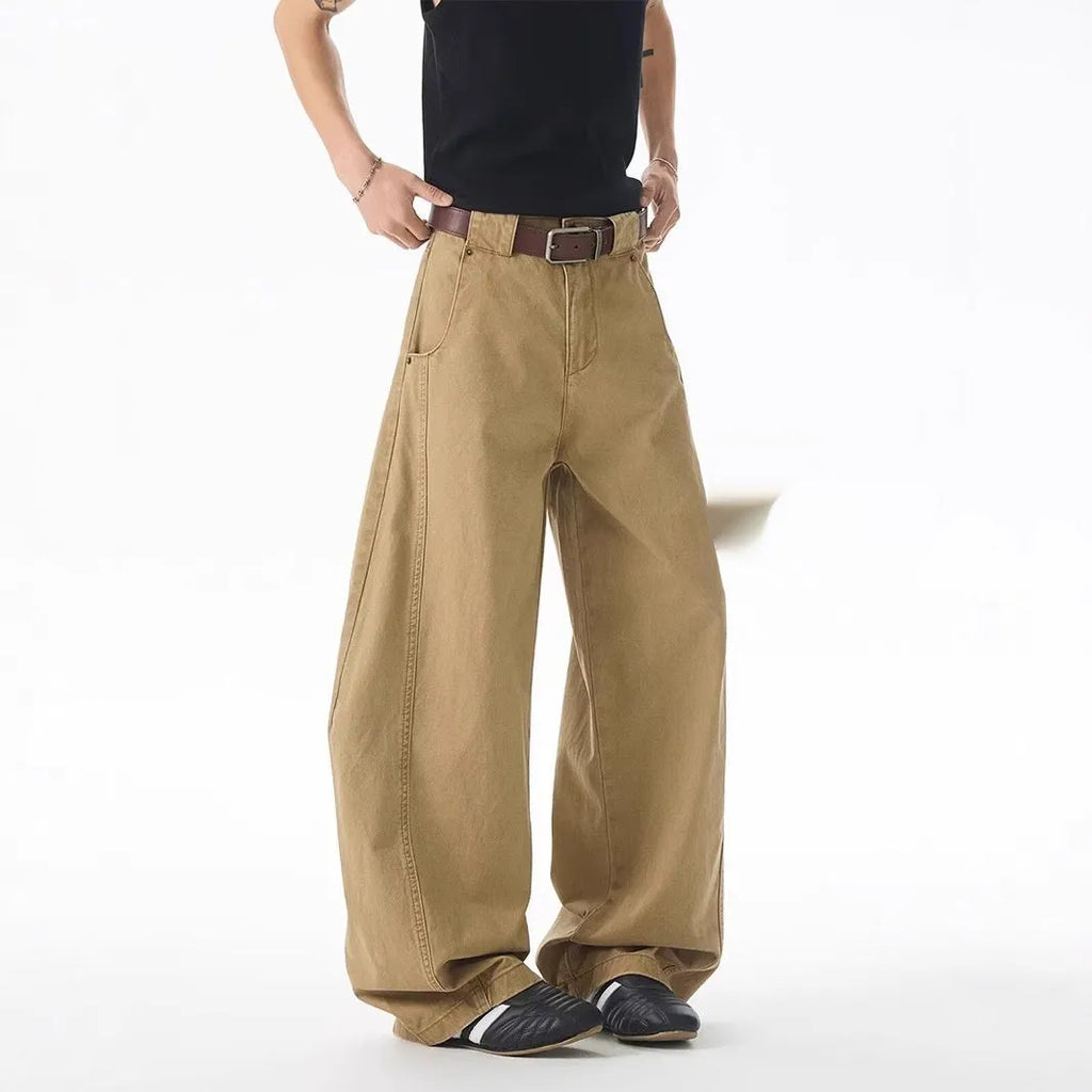 Men's brown loose fit casual jeans with straight leg design and button fly opening