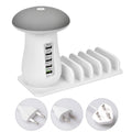 White mushroom-shaped USB charging dock with 5 ports and built-in LED night light on a desk