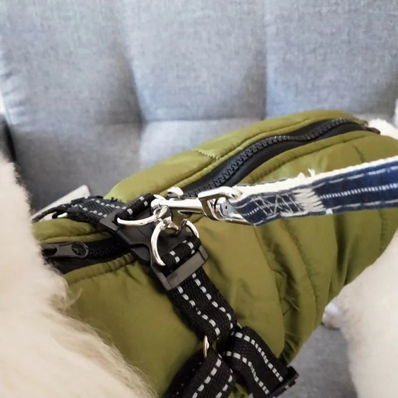 Waterproof dog coat with integrated harness in rain silk fabric available in red, navy blue, and army green colours