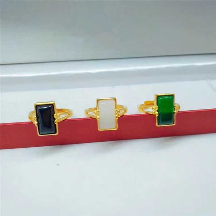 Adjustable brass gold-plated ring with long gemstone in national style design