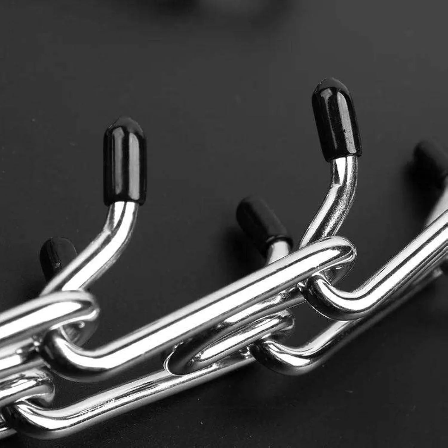 Stainless steel dog training prong collar with adjustable chain links and rubber comfort tips