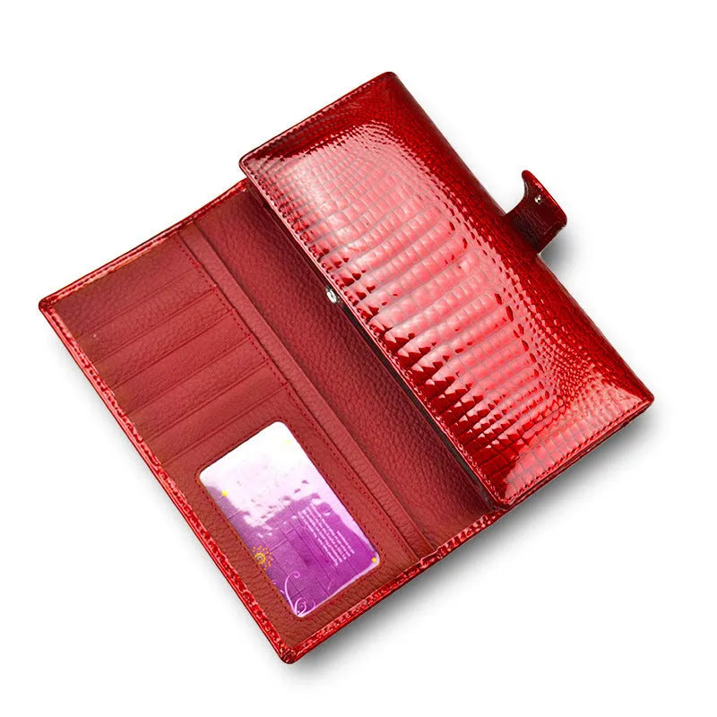 Women's patent leather coin purse with crocodile pattern texture in red colour