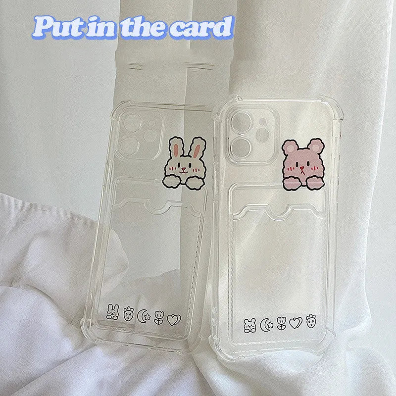 Clear cartoon design iPhone case with a card slot on the back, shown on a phone.