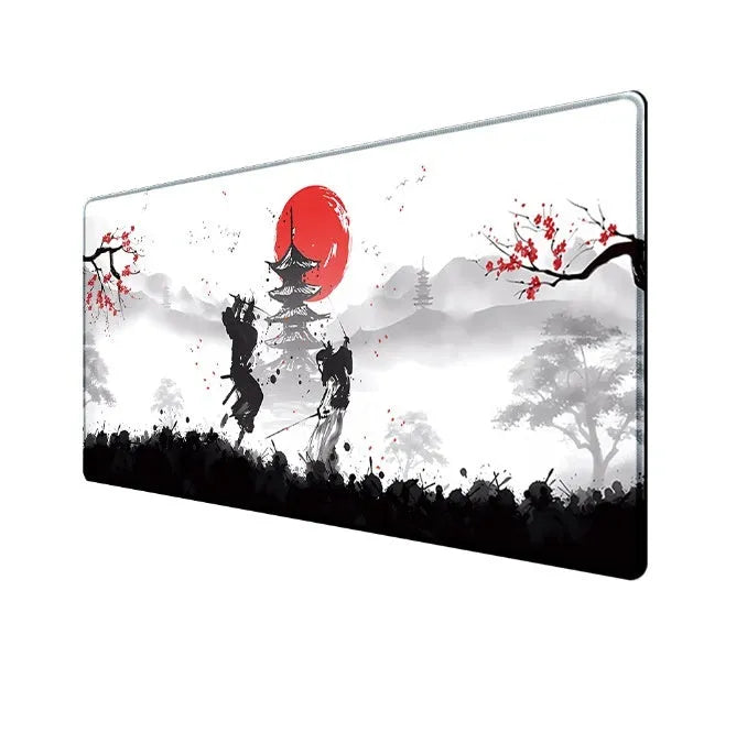 Japanese Samurai design cloth gaming mouse pad with non-slip base on a desk.
