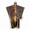 Plastic Halloween decoration featuring a blood-dyed luminous skull on a hanging ghost figure for outdoor displays.
