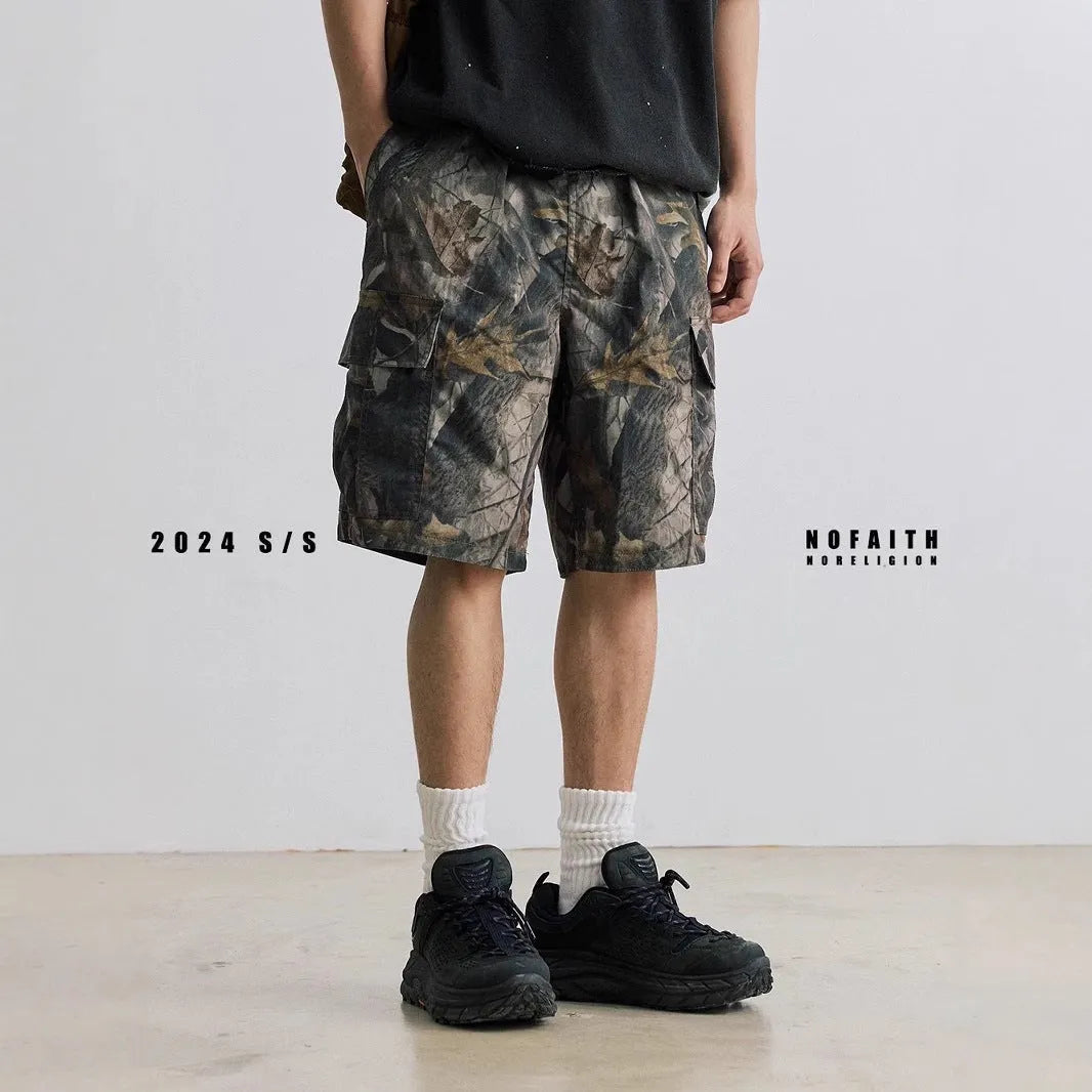 Straight-leg denim shorts in black or army green with mid-waist design and zip fly