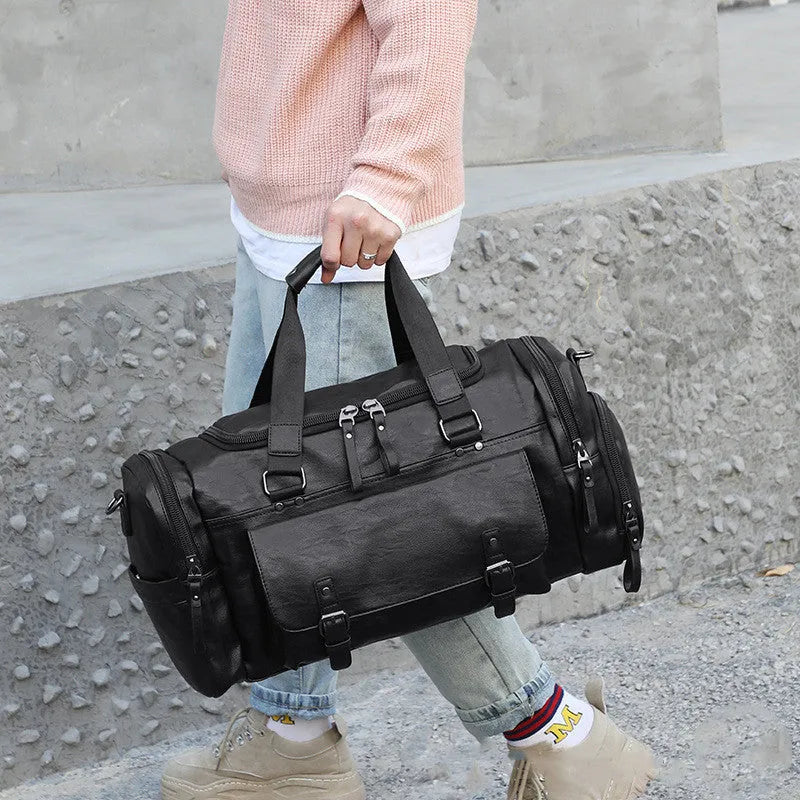 Black large capacity travel bag for shoes and trainers with dimensions 52cm by 19cm by 27cm.