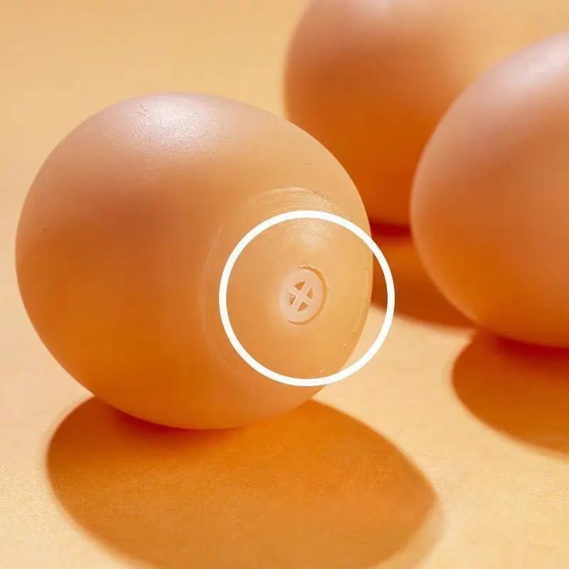 Egg-shaped dog squeaky toy for dental cleaning with sound mechanism