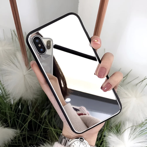 Black iPhone mirror phone case showing reflective glass back, compatible with multiple iPhone models.