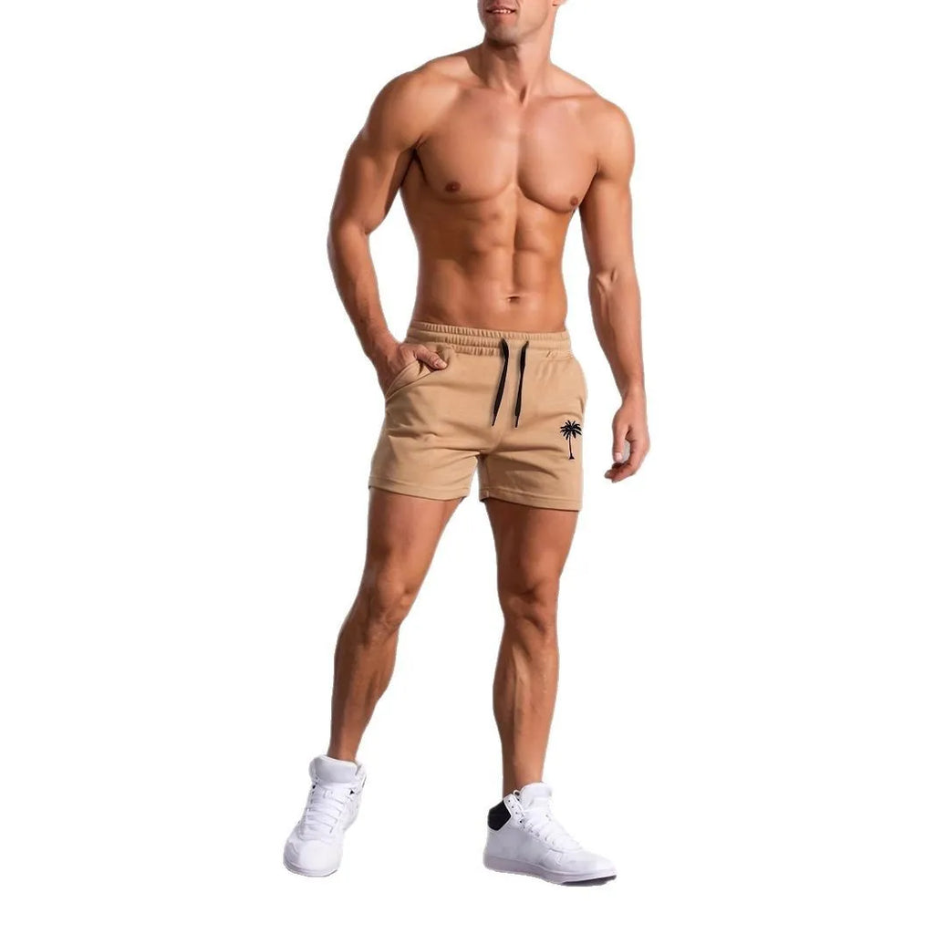 Men's khaki coconut print sports shorts with elastic waistband and straight leg cut