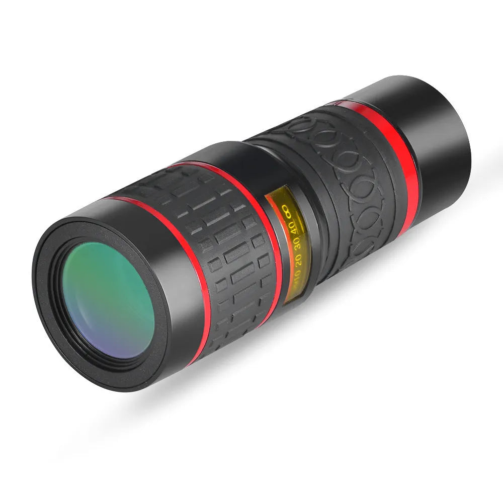 20x mobile phone telescope lens with universal mounting clip and single eye mask on a white background.