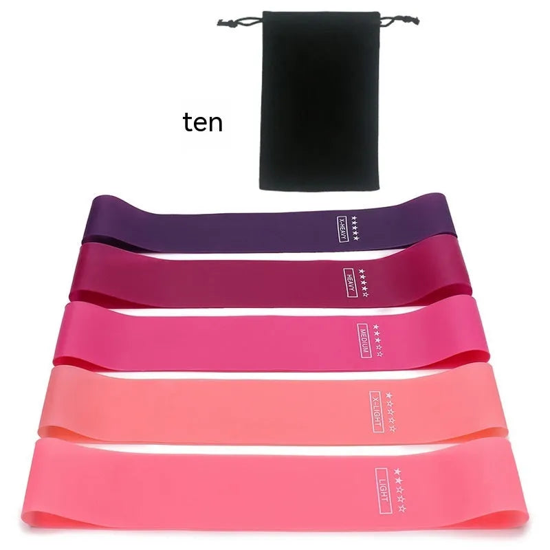 Five colour-coded TPE yoga tension straps with graduated thickness for resistance training