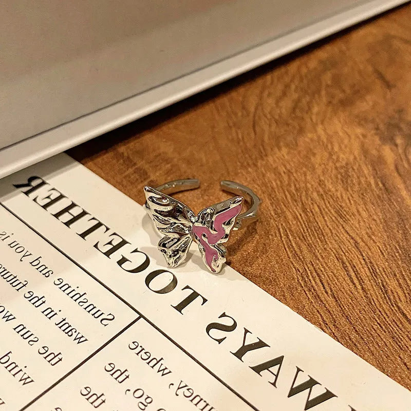 Women's copper butterfly ring with dripping oil finish and adjustable open loop design