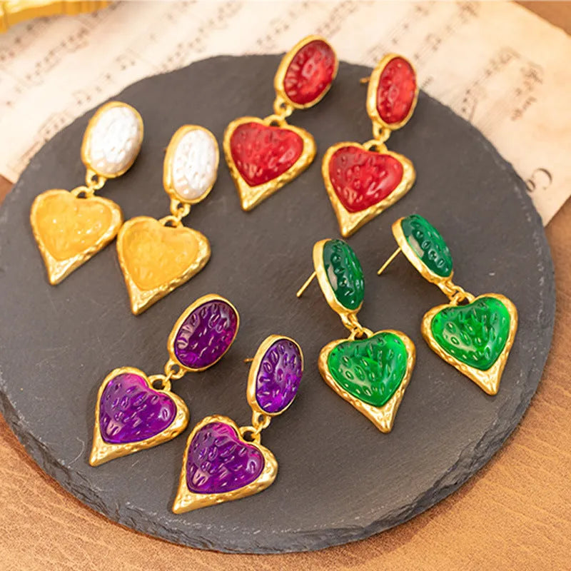 Silver needle pleated oval love heart stud earrings in alloy, showing green, purple, red, and yellow and white colour options.