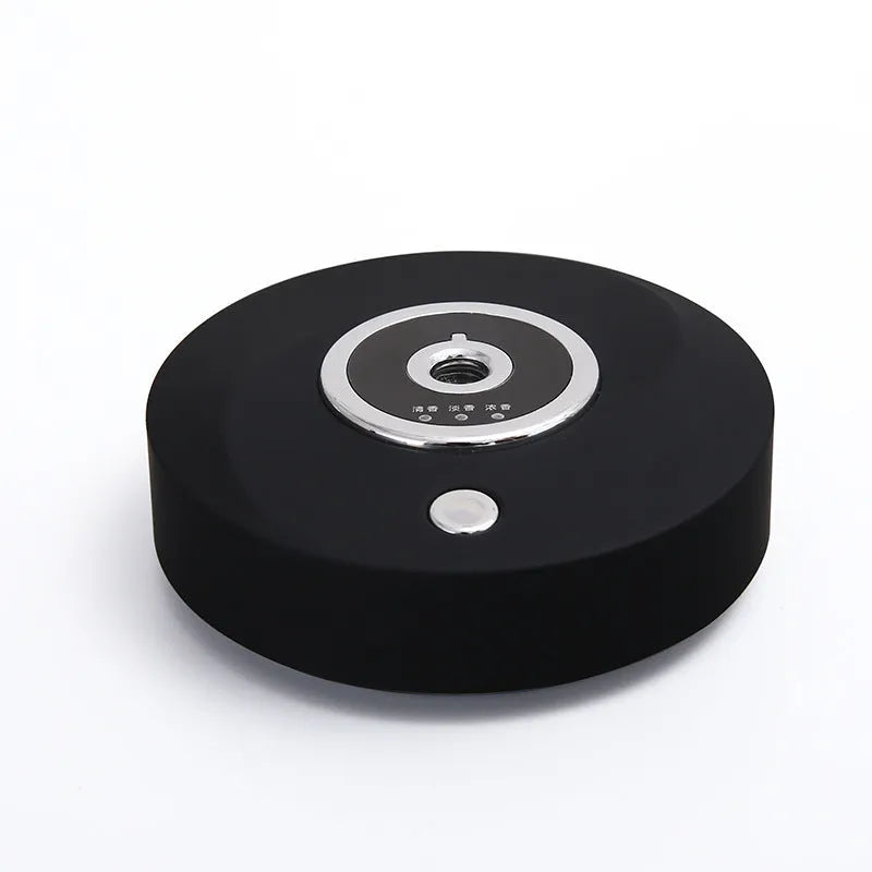 USB-powered plastic car air freshener holder in black, grey, or white colour with charging cable.
