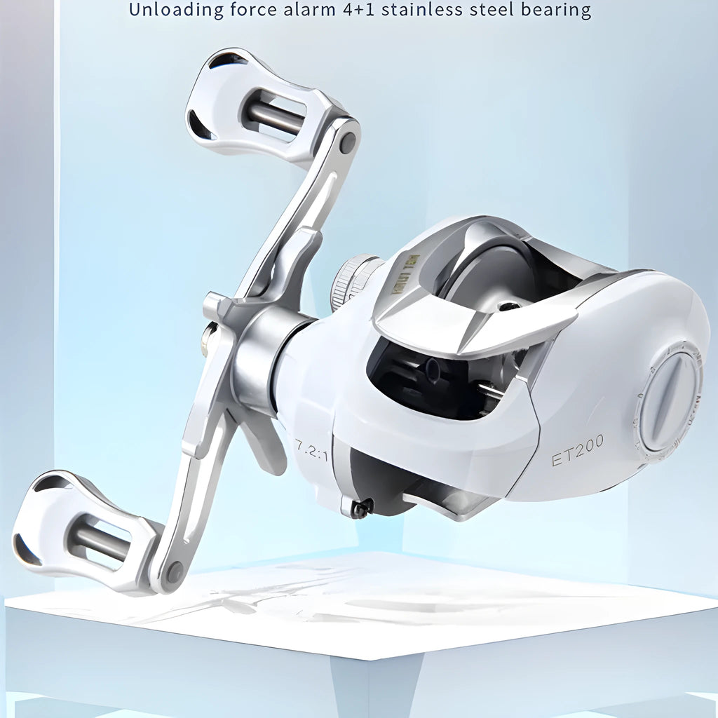 Small white ET Drop Wheel bait casting fishing reel on a neutral background.