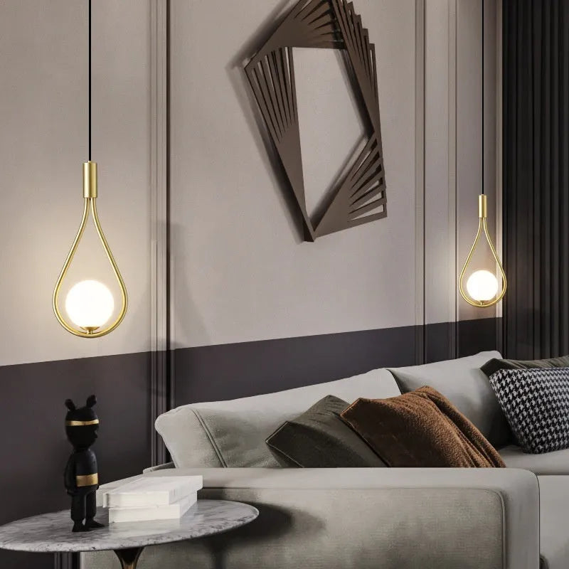 Modern copper bedside chandelier with honeycomb glass cover for bedroom ambient lighting