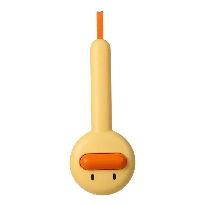 Small yellow duck-shaped pet grooming comb with open section design and needle pins for hair removal