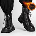 Men's black mid-top Tide British leather boots with a flat rubber sole on a neutral background.