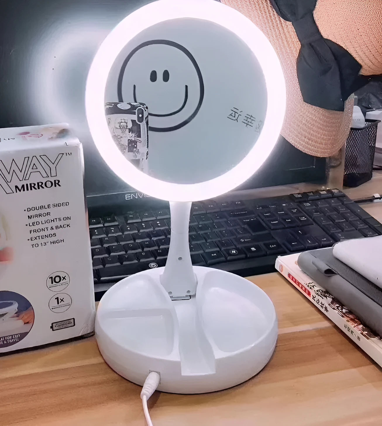 White acrylic frame vanity mirror with LED lights, USB charging port, and foldable design showing storage compartments
