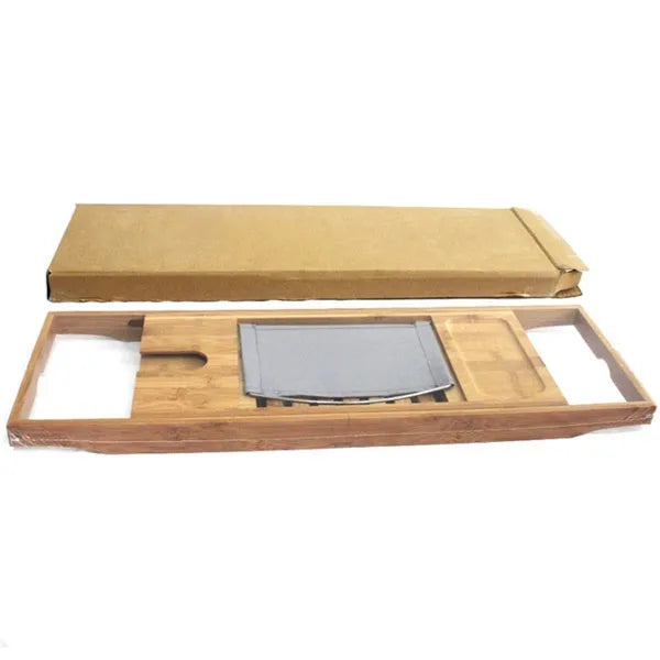 Bamboo desktop storage shelf for bathroom organisation next to bathtub