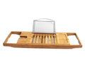 Bamboo desktop storage shelf for bathroom organisation next to bathtub