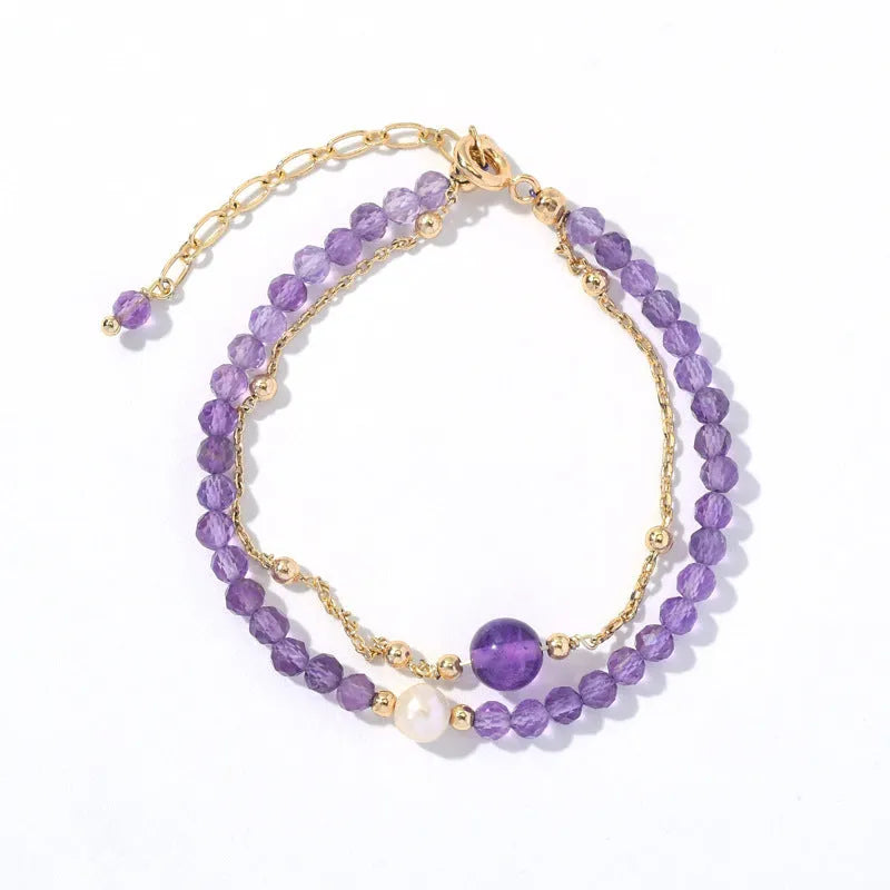 Chinese style women's bracelet with amethyst diamond-shaped crystals and electroplated finish.