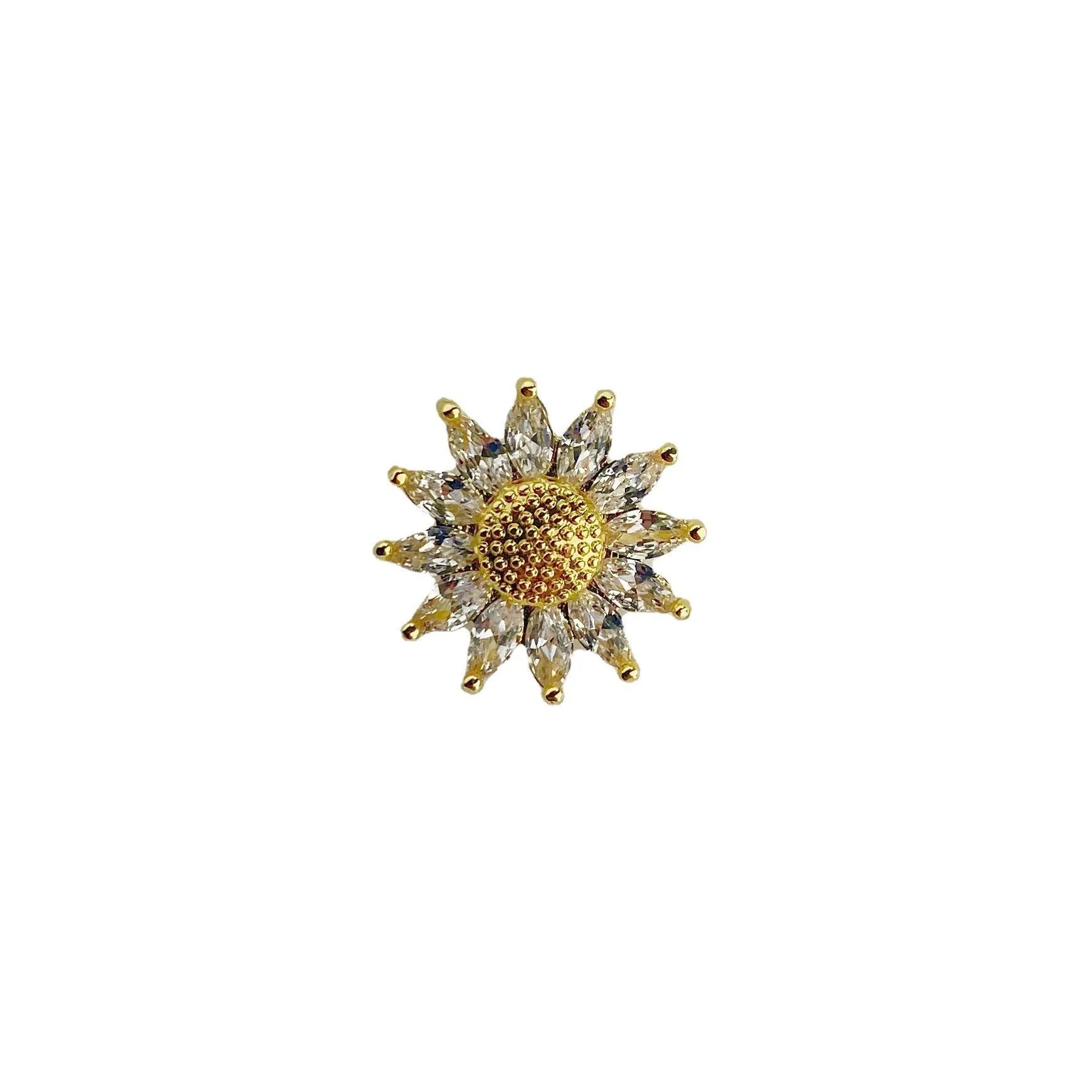 Geometric-shaped copper brooch with an electroplated coloured metallic finish.
