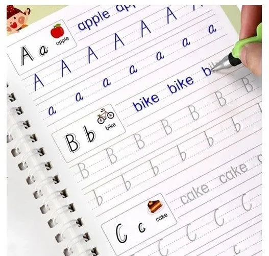 Magic practice writing copybook set with hard cover, thick paper, pen holder, and refills on a desk