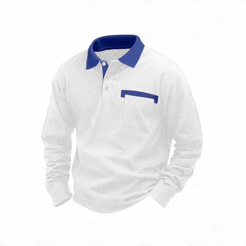 Man modelling a loose-fit long-sleeved waffle-knit polo shirt in a solid colour with an asymmetrical style detail.