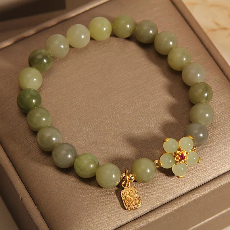 Women's casual alloy bracelet with grey jade stone accent on wrist
