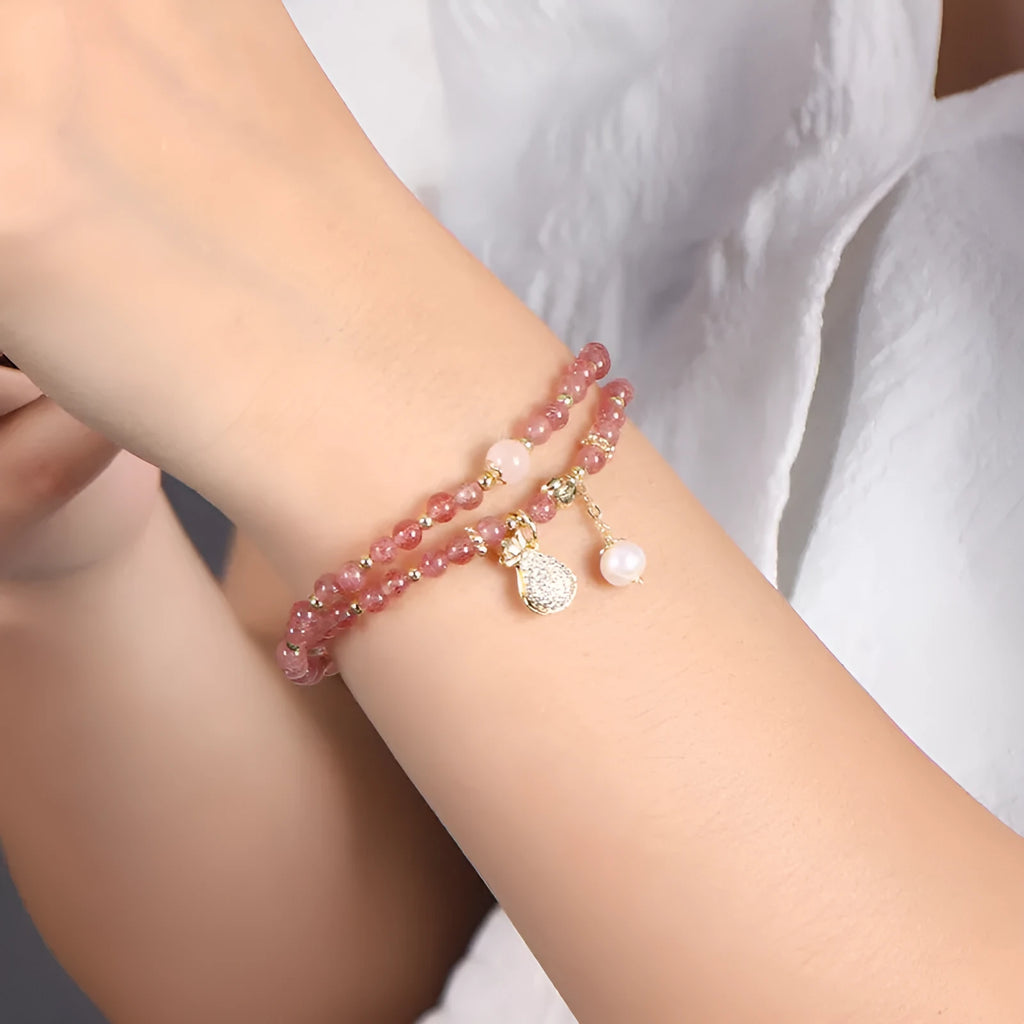 Women's strawberry quartz crystal bracelet with geometric design for money drawing and luck changing