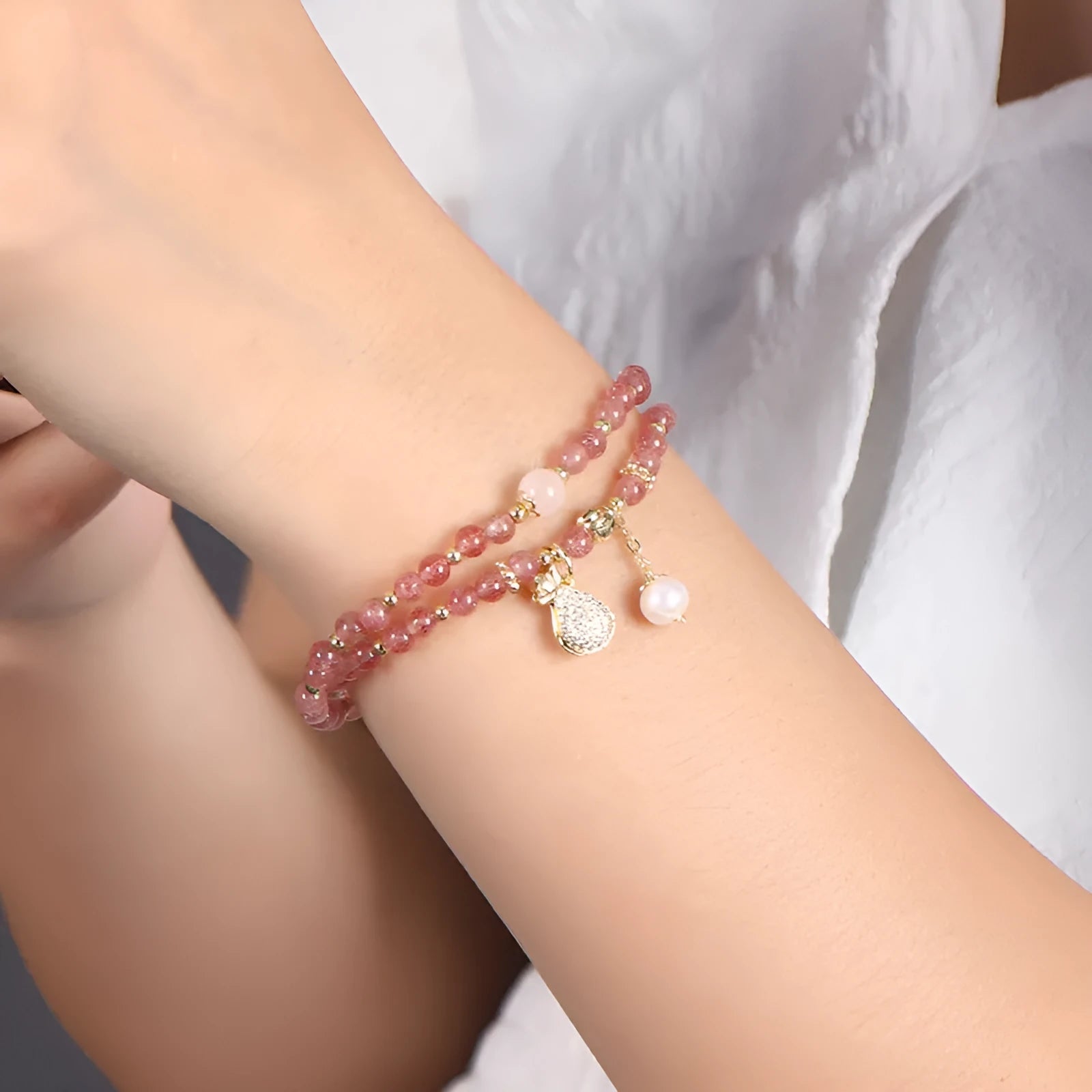 Women's strawberry quartz crystal bracelet with geometric design for money drawing and luck changing